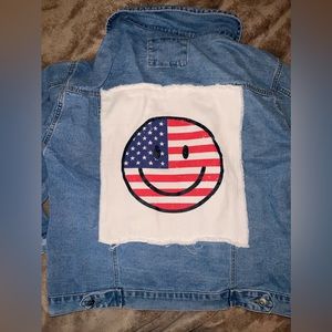 LIKE NEW..American smiley face jean jacket. Size M from Fantastic fawn!! So cute